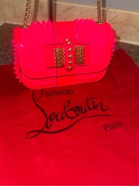 Christian Louboutin HOT PINK sweet charity Crossbody like new with dusty.